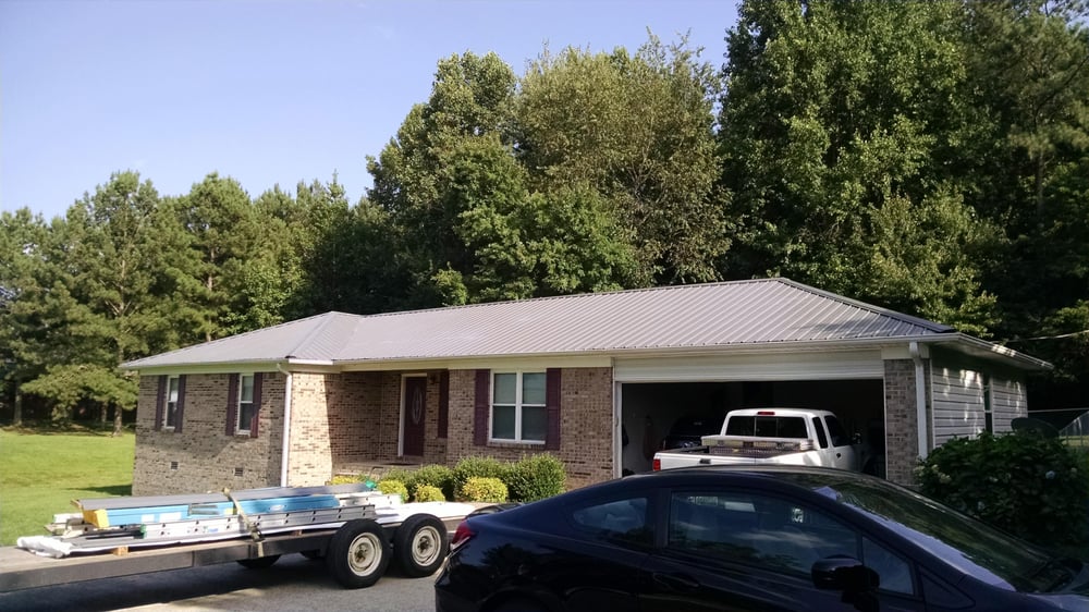 Slide of JC Metal Roofing