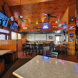 More seating with projection screen and 2nd bar top