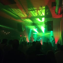 a crowd of people at a concert a crowd of people at a concert
