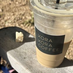 Kora Kora Coffee - Iced oat milk latte with honey and cinnamon!