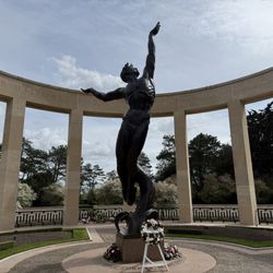 Cimetière américain de Normandiea - Sculpture's name:  Spirit of American youth rising from the waves.