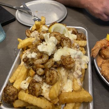 Shuckin' Shack Oyster Bar - Poutine - Seafood Near Me - Ocala, Florida