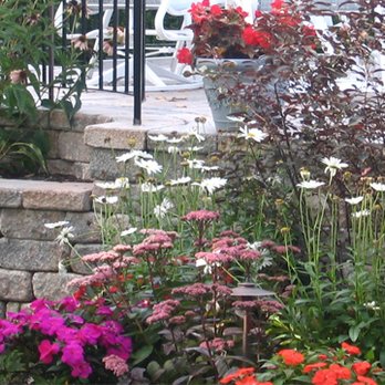Black Diamond Landscapes - a garden with flowers and a gazebo - Landscaping Near Me - Woburn, Massachusetts Black Diamond Landscapes - a garden with flowers and a gazebo - Landscaping Near Me - Woburn, Massachusetts