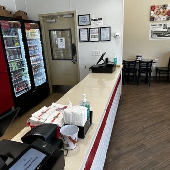 Shipley Do-Nuts - a restaurant counter with a vending machine - Donuts Near Me - Houston, Texas Shipley Do-Nuts - a restaurant counter with a vending machine - Donuts Near Me - Houston, Texas