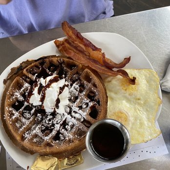 Wayfinder - Brownie Waffle with eggs over medium and bacon - American Near Me - Estes Park, Colorado Wayfinder - Brownie Waffle with eggs over medium and bacon - American Near Me - Estes Park, Colorado
