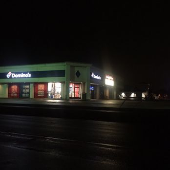 Dominos - the outside of a store at night - Pizza Near Me - Clio, Michigan