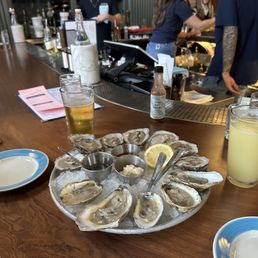 Dozen Raw Oysters and drinks Dozen Raw Oysters and drinks