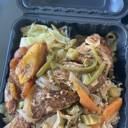 Red snapper, rice and peas, cabbage and plantains. Red snapper, rice and peas, cabbage and plantains.