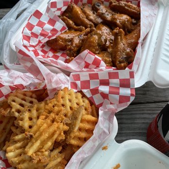 Heavenly Buffaloes - 12 wings with medium Buffalo sauce and 1/2 order of fries. - Chicken Wings Near Me - Chapel Hill, North Carolina Heavenly Buffaloes - 12 wings with medium Buffalo sauce and 1/2 order of fries. - Chicken Wings Near Me - Chapel Hill, North Carolina