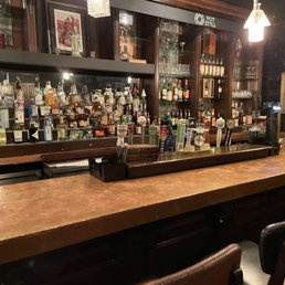 a bar with a lot of liquor a bar with a lot of liquor