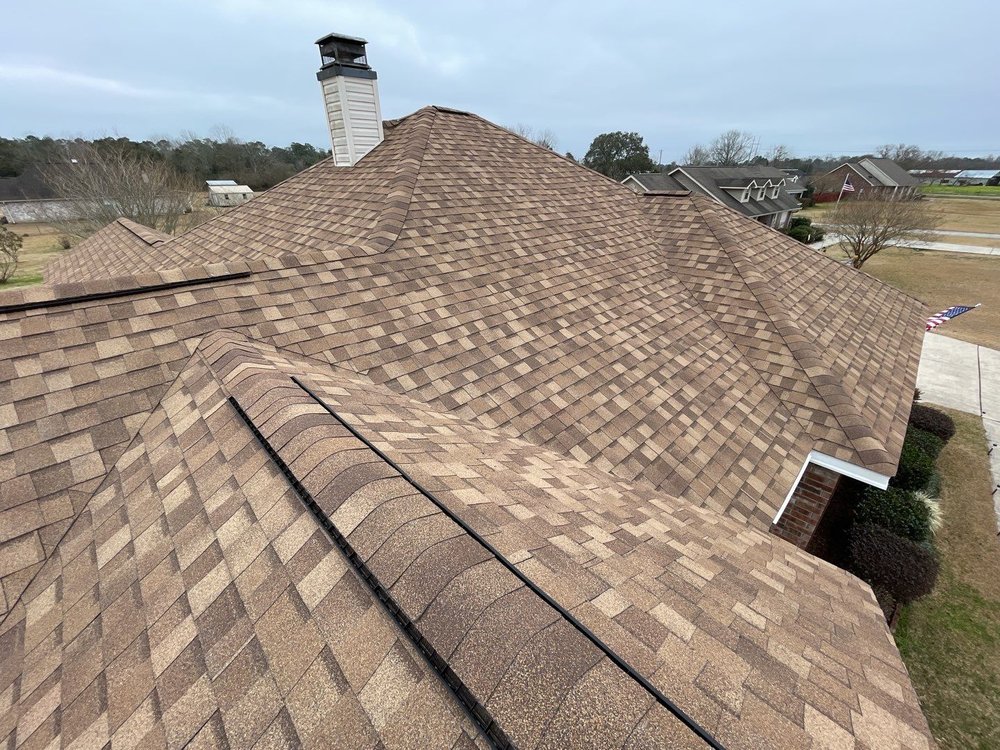 Slide of Coastal Roofing