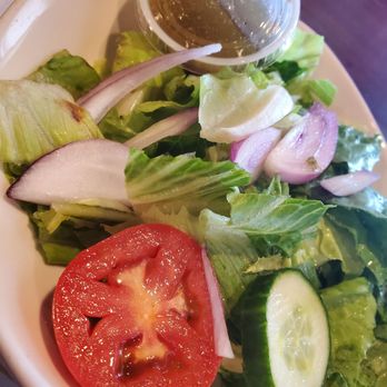 Troni's Italian Restaurant - Side salad with house-made Italian - Pizza Near Me - Dayton, Ohio Troni's Italian Restaurant - Side salad with house-made Italian - Pizza Near Me - Dayton, Ohio