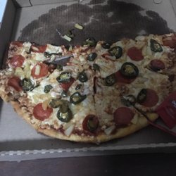 Pizzas Gran Beli - This pizza is delicious! They give you preference of three toppings for an affordable price. They also deliver!