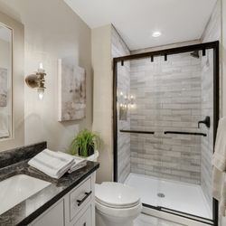 Creations by Caty - Beautiful new bathroom in the newly finished lower level. Stunning tile!