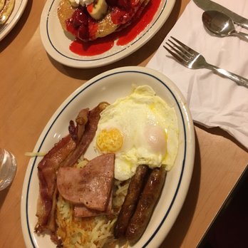 IHOP - Sampler platter with strawberry banana pancakes! - Breakfast & Brunch Near Me - Terre Haute, Indiana IHOP - Sampler platter with strawberry banana pancakes! - Breakfast & Brunch Near Me - Terre Haute, Indiana