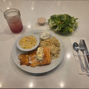 NORMS Restaurant - Grilled Salmon, Rice, Cream Corn, House Salad with Greek Dressing and a Pomegranate Lemonade. - American Near Me - Carson, California