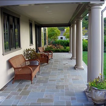 Marion Landscape Construction - a porch with wicker chairs - Landscaping Near Me Marion Landscape Construction - a porch with wicker chairs - Landscaping Near Me