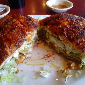 Los Reyes De La Torta - Chorizo and Potatoe Torta with Red Sauce, Cheese and Sour Cream - Mexican Near Me - Tempe, Arizona Los Reyes De La Torta - Chorizo and Potatoe Torta with Red Sauce, Cheese and Sour Cream - Mexican Near Me - Tempe, Arizona