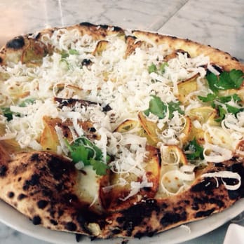 Quattro - Potato and Herb pizza with fresh grated Parmigiana. - Pizza Near Me - Boston, Massachusetts Quattro - Potato and Herb pizza with fresh grated Parmigiana. - Pizza Near Me - Boston, Massachusetts