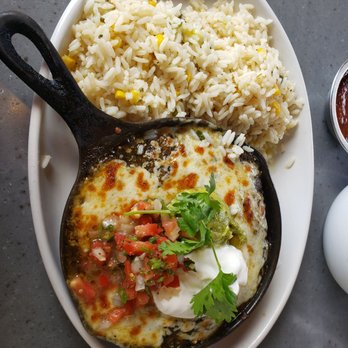 Blanco Cocina + Cantina - Green chile pork enchiladas with rice - Tacos Near Me - Tucson, Arizona Blanco Cocina + Cantina - Green chile pork enchiladas with rice - Tacos Near Me - Tucson, Arizona