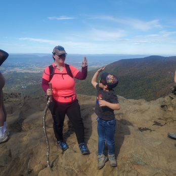 Hawksbill Trail - Child #2 celebrating getting to the top! - Hiking Near Me - Luray, Virginia Hawksbill Trail - Child #2 celebrating getting to the top! - Hiking Near Me - Luray, Virginia