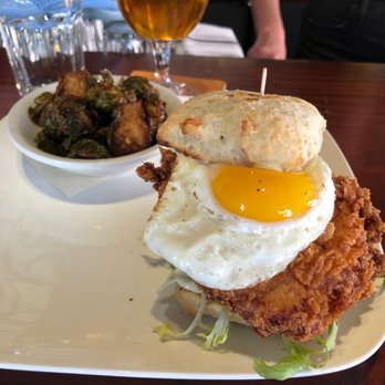 The Monk's Kettle - Today's special, fried chicken thigh cheddar cheese biscuit avocado frisée smoked mustard aioli sunny side egg and a side of brussels - Bars Near Me - Oakland, California The Monk's Kettle - Today's special, fried chicken thigh cheddar cheese biscuit avocado frisée smoked mustard aioli sunny side egg and a side of brussels - Bars Near Me - Oakland, California