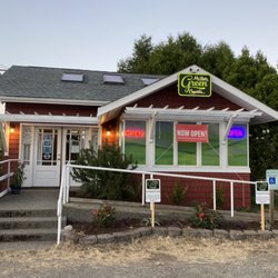 Mo Beta Green - Sunset view of building.