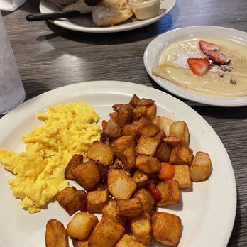 Fork and Spoon - Oma's Plate- Two eggs any style, country fried potatoes with choice of pan crepes - New American Near Me - New Braunfels, Texas