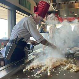 chef michael creates an image of a lobster out of a huge batch of fried rice at benihana in key west. chef michael creates an image of a lobster out of a huge batch of fried rice at benihana in key west.
