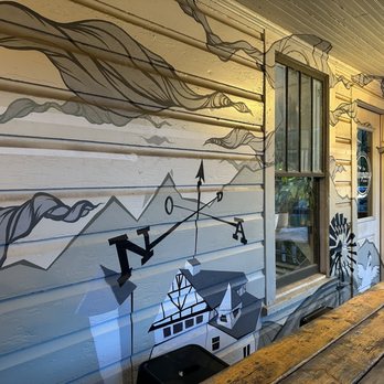 Noda Company Store - a porch with a painted mural - Beer Bar Near Me - Charlotte, North Carolina Noda Company Store - a porch with a painted mural - Beer Bar Near Me - Charlotte, North Carolina