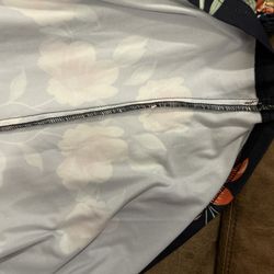 Tailor Alterations - She was to cut open the sides remove an inch per side. This stitch did not!