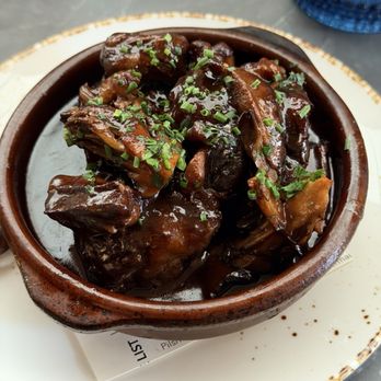 Vaca - Rabo de toro (braised oxtail and mushrooms) - Spanish Near Me - Los Angeles, California Vaca - Rabo de toro (braised oxtail and mushrooms) - Spanish Near Me - Los Angeles, California