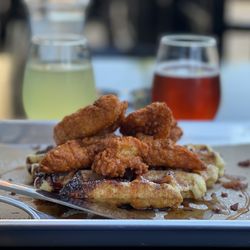 Press Waffle Co. - Spicy chicken and waffles with pineapple Mamosa Apple hibiscus Mamosa