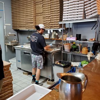 One 6 Three - a man working in a commercial kitchen - Pizza Near Me - New Haven, Connecticut One 6 Three - a man working in a commercial kitchen - Pizza Near Me - New Haven, Connecticut