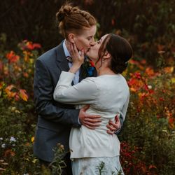 Samson Photography - Queer sweeties kiss during autumn coastal wedding.