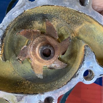 Kar King Auto - This is the inside of the water pump.  Rusted and worn out. - Auto Repair Near Me - Ontario, California