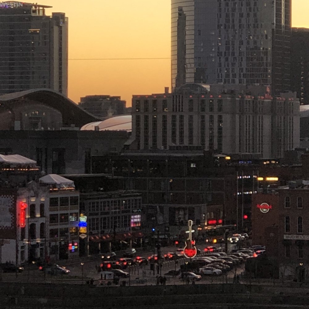 Nissan Stadium - Beautiful view of Broadway as the sun sets on Tennessee in the the Music City Bowl. - Stadiums & Arenas Near Me - Nashville, Tennessee