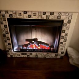 Lovely Ambiance. Bedroom faux-fireplace. Lovely Ambiance. Bedroom faux-fireplace.