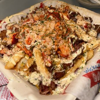 Wicked Maine Lobster - Lobster French fries with bacon bits Looks delicious but sauce was bland and lobster was cold with warm French fries - Sandwiches Near Me - Honolulu, Hawaii Wicked Maine Lobster - Lobster French fries with bacon bits Looks delicious but sauce was bland and lobster was cold with warm French fries - Sandwiches Near Me - Honolulu, Hawaii