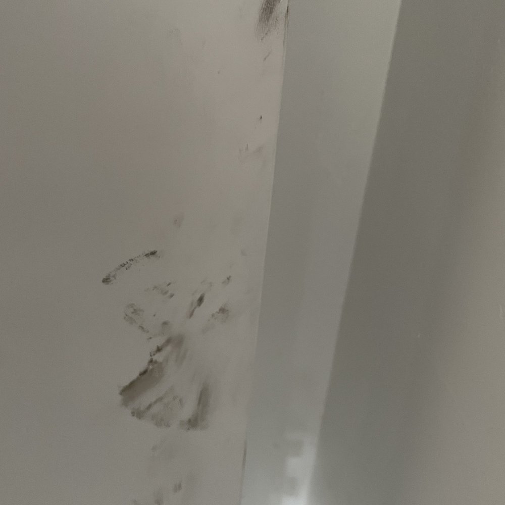 Lugg - Black hand print on wall. No clean hands or gloves - Movers Near Me Lugg - Black hand print on wall. No clean hands or gloves - Movers Near Me