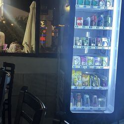 Los Pinos - Vending Machine for Nicotine, Condoms, and Rolling papers.