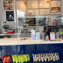 a counter with snacks and drinks