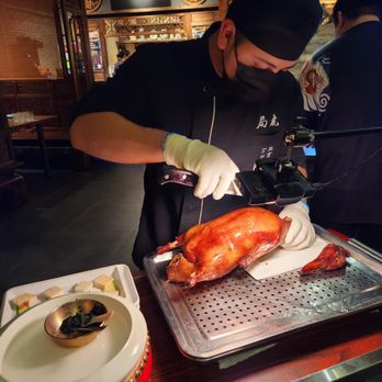 Juqi - A man carving Peking Duck! - Chinese Near Me - Flushing, New York