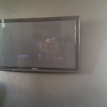 Dynamic Audio Video Solutions - Nice mount, small hole, no wires. - Home Theatre Installation Near Me Dynamic Audio Video Solutions - Nice mount, small hole, no wires. - Home Theatre Installation Near Me