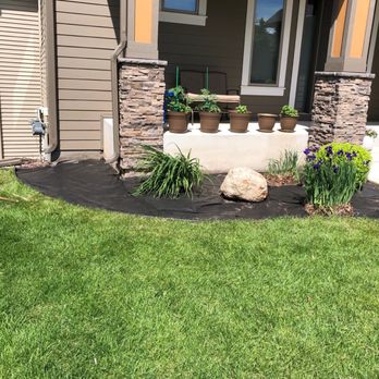 All Over Elementz Outdoor Services - a front yard - Snow Removal Near Me