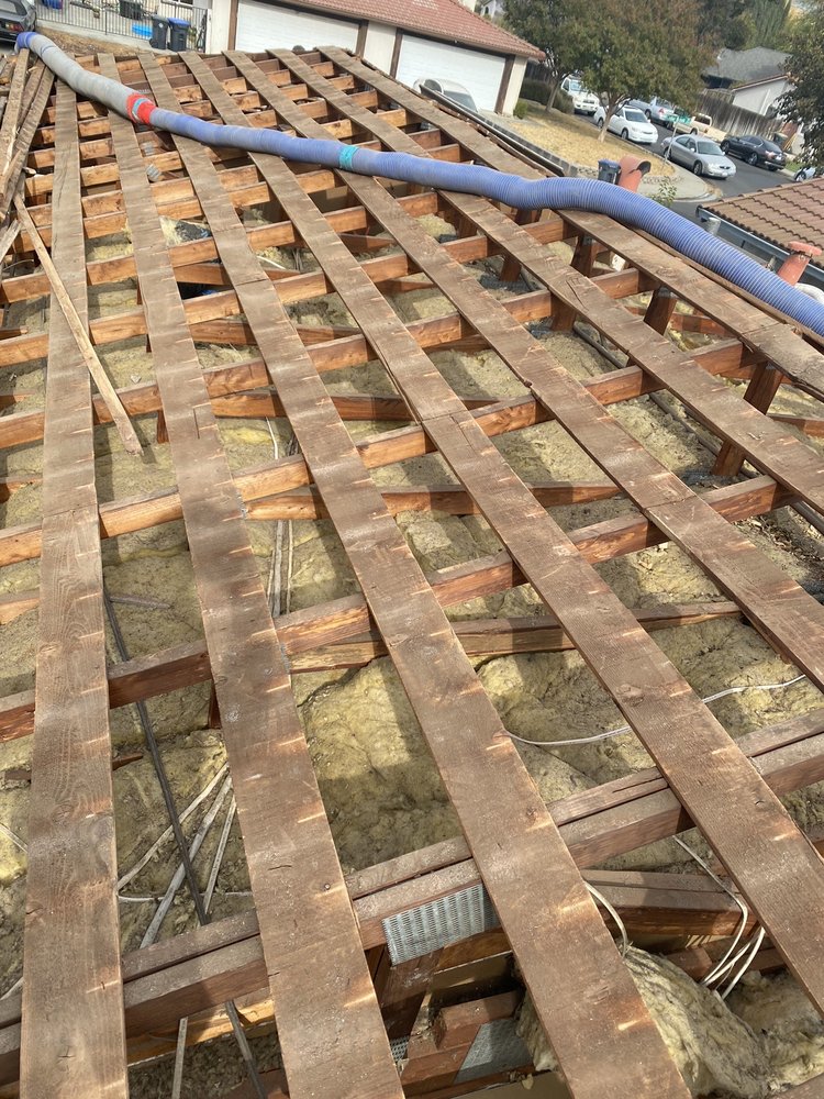 Slide of Aguilar Roofing