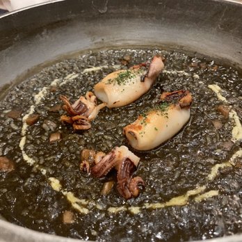 Mercado Little Spain - Ink squid Soanish rice with 2 pieces of squid for $40 - Seafood Near Me - New York, New York
