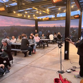 Avidity Wines - Musician playing inside our heated Pavilion. - Wine Tasting Room Near Me - Newberg, Oregon