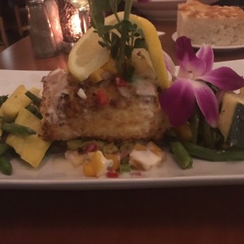 Switchback Grille - the special, halibut with mango curry chutney.  flower is edible too - Bars Near Me - Springdale, Utah