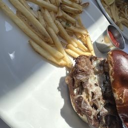 Prime rib sandwich on pretzel bun!